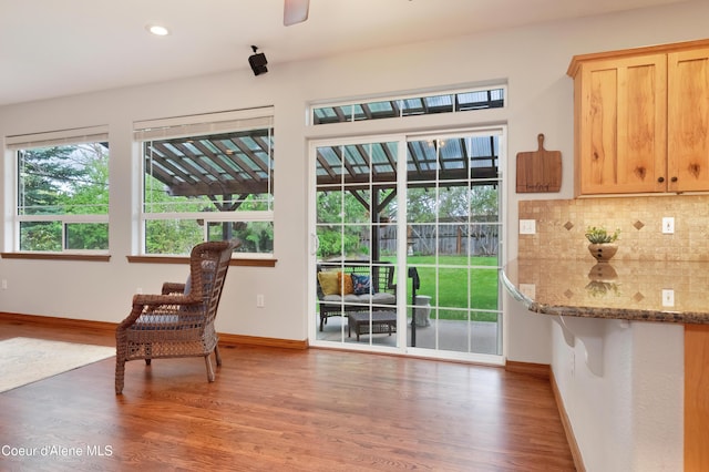 8533 N Tartan Dr, Hayden, ID 83835 - living area featuring wood finished floors, baseboards, recessed lighting, and a ceiling fan
