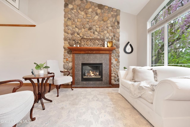 8533 N Tartan Dr, Hayden, ID 83835 - living room featuring lofted ceiling and a stone fireplace