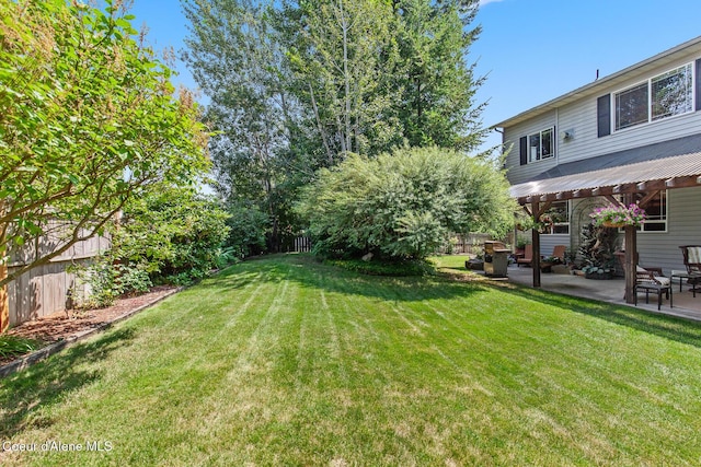 8533 N Tartan Dr, Hayden, ID 83835 - view of yard featuring a patio area
