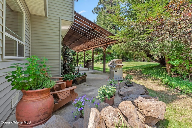8533 N Tartan Dr, Hayden, ID 83835 - view of patio featuring area for grilling and a pergola