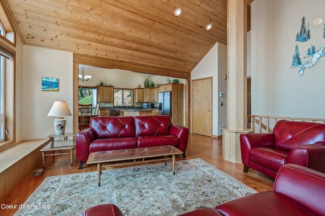 living room with an inviting chandelier, high vaulted ceiling, light wood-type flooring, visible vents, and wood ceiling