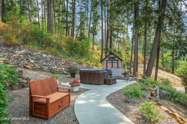 exterior space featuring a hot tub
