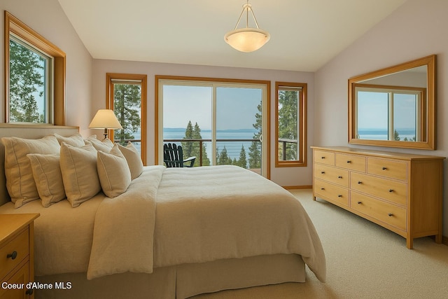 bedroom with a water view, baseboards, light colored carpet, and lofted ceiling