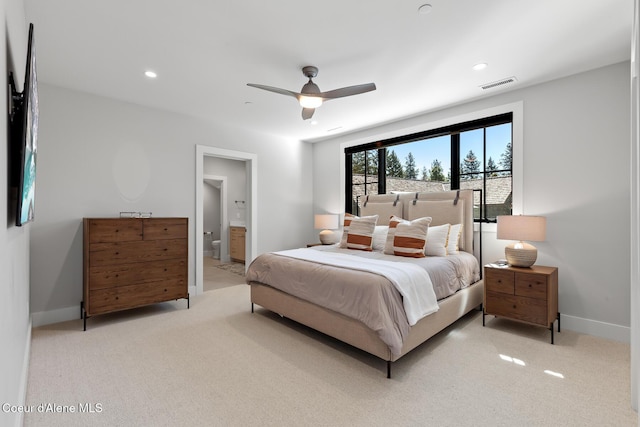 bedroom featuring ceiling fan, light colored carpet, ensuite bath, recessed lighting, and visible vents