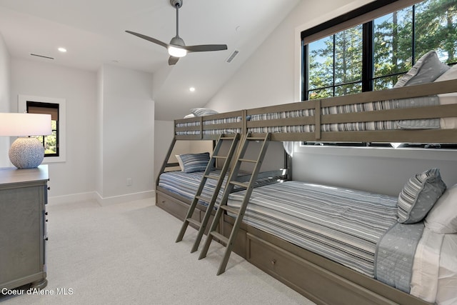 bedroom featuring visible vents, baseboards, lofted ceiling, carpet flooring, and recessed lighting