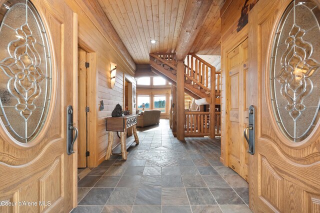 122 Makridge Ln, Kingston, ID 83839 - entryway featuring wooden walls, wooden ceiling, recessed lighting, and stone tile flooring