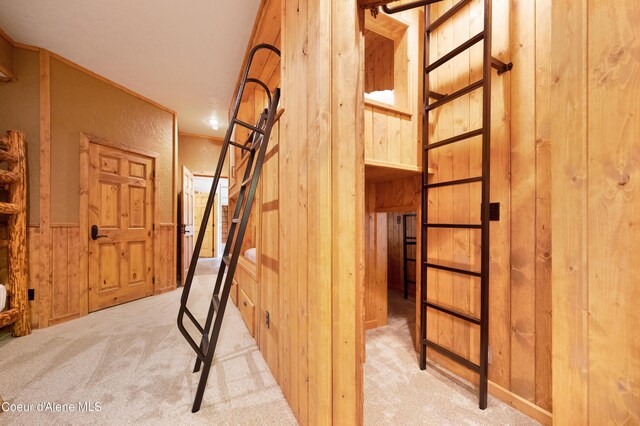 122 Makridge Ln, Kingston, ID 83839 - staircase with carpet and wood walls