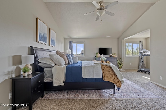 9362 N Prince William Loop, Hayden, ID 83835 - bedroom featuring vaulted ceiling, carpet floors, baseboards, and a ceiling fan