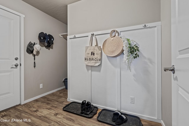 9362 N Prince William Loop, Hayden, ID 83835 - interior space featuring wood finished floors and baseboards