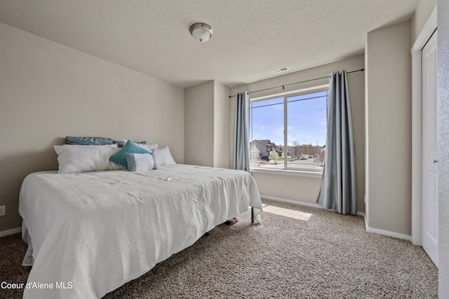 9362 N Prince William Loop, Hayden, ID 83835 - carpeted bedroom with baseboards