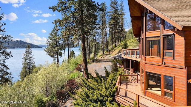 3665 E Ogara Rd, Harrison, ID 83833 - view of property exterior with a shingled roof and a water view