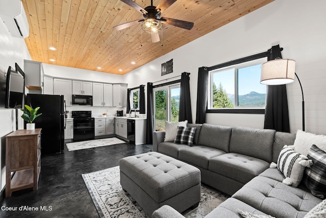 247 Living Waters Way, Priest River, ID 83856 - living area featuring an AC wall unit, recessed lighting, wood ceiling, and ceiling fan