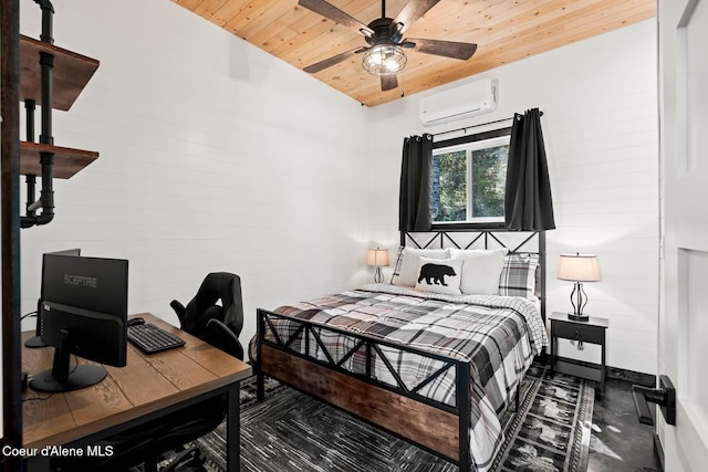 247 Living Waters Way, Priest River, ID 83856 - bedroom with a wall mounted AC, wooden ceiling, and finished concrete flooring