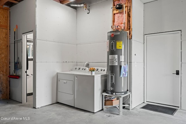 247 Living Waters Way, Priest River, ID 83856 - washroom with laundry area, washer and clothes dryer, and water heater
