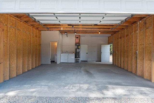 247 Living Waters Way, Priest River, ID 83856 - garage with independent washer and dryer and electric water heater