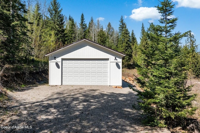 247 Living Waters Way, Priest River, ID 83856 - detached garage featuring a view of trees