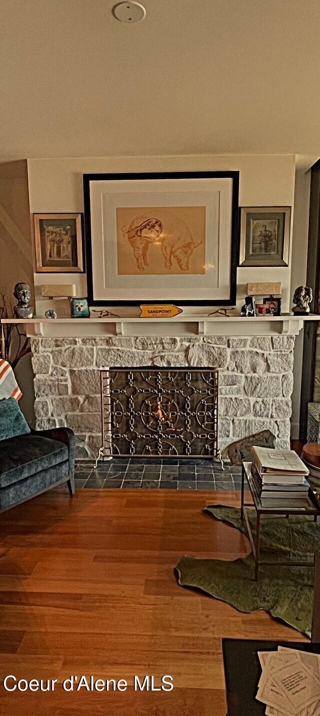412 Sandpoint Ave Unit 332, Sandpoint, ID 83864 - living area with wood finished floors and a fireplace