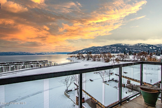412 Sandpoint Ave Unit 332, Sandpoint, ID 83864 - snow covered back of property with a water and mountain view