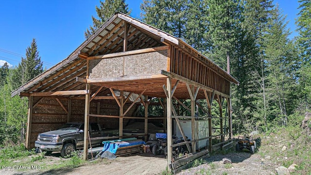 view of parking featuring a detached carport