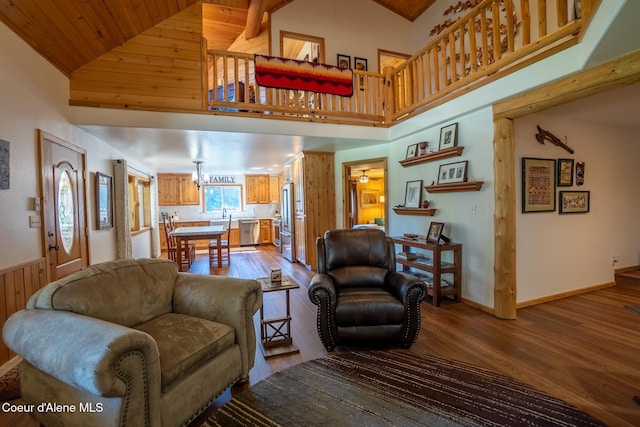 2264 Parker Canyon Rd, Bonners Ferry, ID 83805 - living area featuring wooden walls, high vaulted ceiling, wood ceiling, and wood finished floors