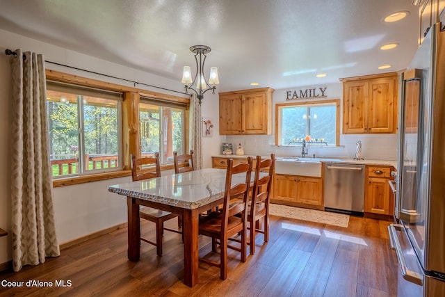 2264 Parker Canyon Rd, Bonners Ferry, ID 83805 - dining room featuring recessed lighting, a notable chandelier, and hardwood / wood-style flooring