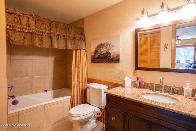 2264 Parker Canyon Rd, Bonners Ferry, ID 83805 - full bathroom featuring tile patterned flooring, vanity, a textured wall, toilet, and tiled shower / bath