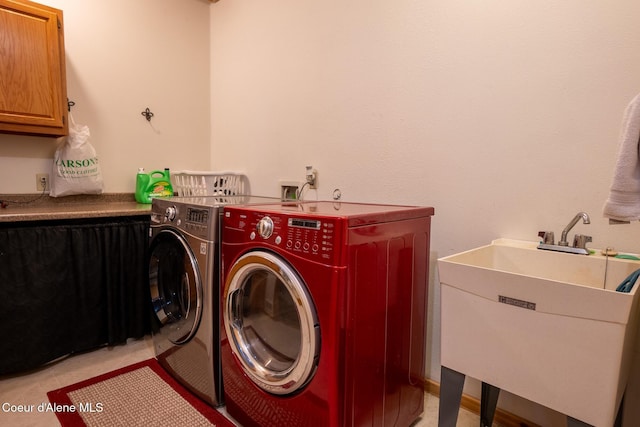2264 Parker Canyon Rd, Bonners Ferry, ID 83805 - laundry room with a sink, cabinet space, and washer and dryer