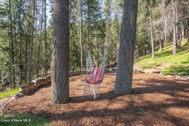 2264 Parker Canyon Rd, Bonners Ferry, ID 83805 - view of play area featuring a wooded view