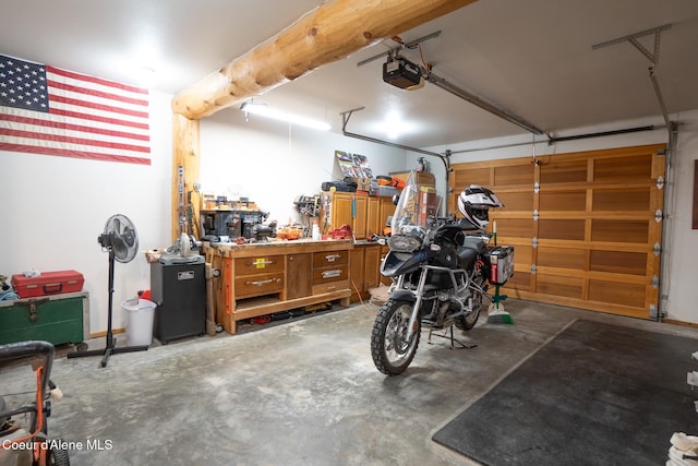 2264 Parker Canyon Rd, Bonners Ferry, ID 83805 - garage with a workshop area and a garage door opener