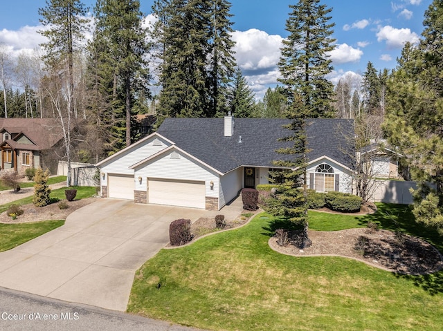 1531 E Twistwood Dr, Hayden, ID 83835 - single story home with fence, stone siding, driveway, a garage, and a front lawn
