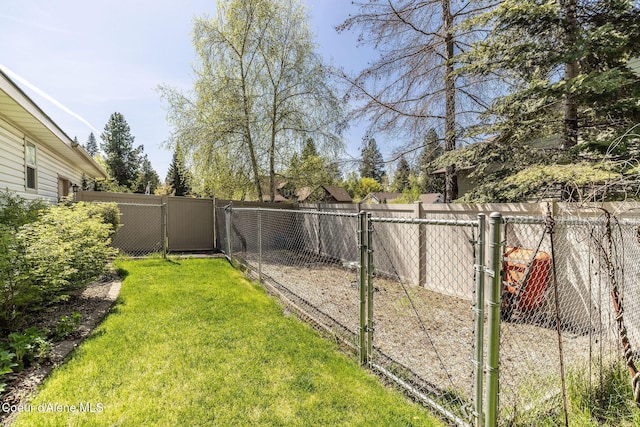 1531 E Twistwood Dr, Hayden, ID 83835 - view of yard with a fenced backyard and a gate