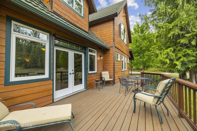 1201 Paradise Valley Rd, Bonners Ferry, ID 83805 - deck featuring outdoor dining space and french doors