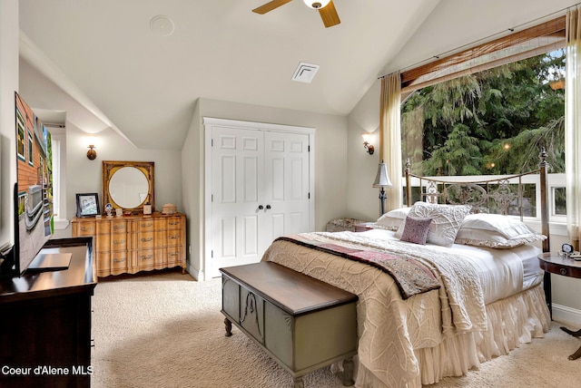 1201 Paradise Valley Rd, Bonners Ferry, ID 83805 - carpeted bedroom with lofted ceiling, a closet, multiple windows, a ceiling fan, and baseboards