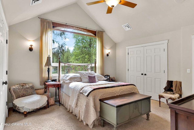 1201 Paradise Valley Rd, Bonners Ferry, ID 83805 - bedroom with light carpet, vaulted ceiling, a closet, and a ceiling fan