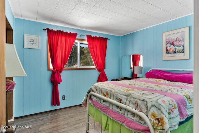 19856 B St Joe River Rd, Calder, ID 83808 - bedroom featuring wooden walls and wood finished floors