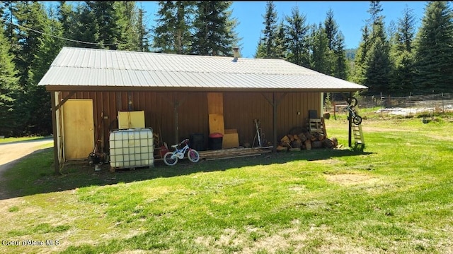 19856 B St Joe River Rd, Calder, ID 83808 - view of pole building featuring a yard
