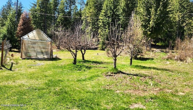 19856 B St Joe River Rd, Calder, ID 83808 - view of yard with an exterior structure and an outdoor structure