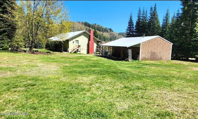 19856 B St Joe River Rd, Calder, ID 83808 - view of yard with an outbuilding and an outdoor structure