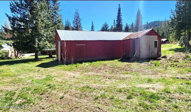 19856 B St Joe River Rd, Calder, ID 83808 - view of pole building with a yard