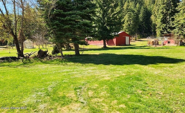 19856 B St Joe River Rd, Calder, ID 83808 - view of yard featuring an outbuilding and a pole building