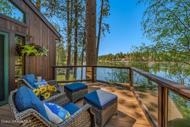 deck featuring a water view