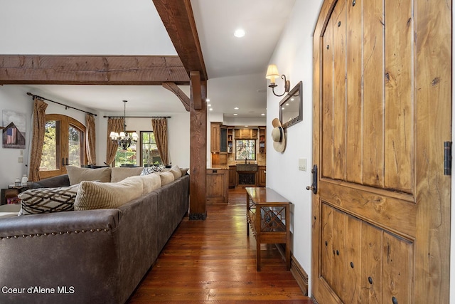 6012 W Quartzite Ln, Coeur Dalene, ID 83814 - living room featuring dark wood-type flooring, beamed ceiling, a chandelier, recessed lighting, and french doors