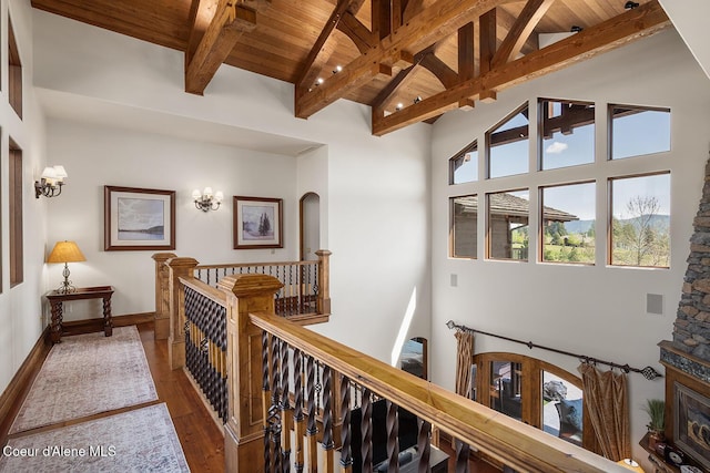 6012 W Quartzite Ln, Coeur Dalene, ID 83814 - corridor with wood ceiling, beam ceiling, an upstairs landing, wood finished floors, and high vaulted ceiling