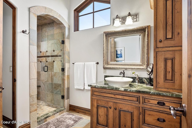 6012 W Quartzite Ln, Coeur Dalene, ID 83814 - full bath with a stall shower, vanity, and baseboards