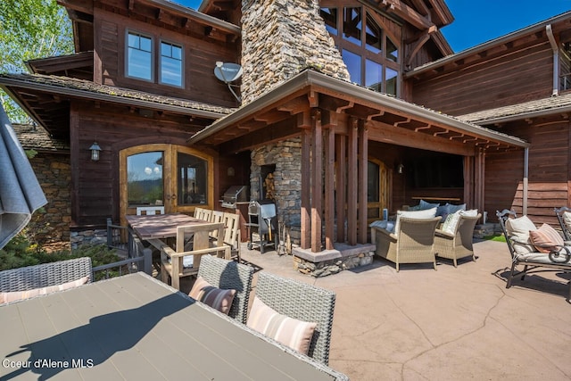 6012 W Quartzite Ln, Coeur Dalene, ID 83814 - view of patio featuring outdoor lounge area, outdoor dining area, and grilling area