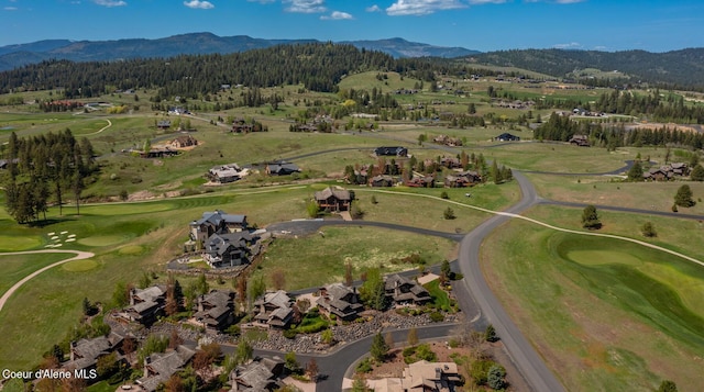 6012 W Quartzite Ln, Coeur Dalene, ID 83814 - aerial view of property's location with a mountainous background, a local golf course, and a heavily wooded area