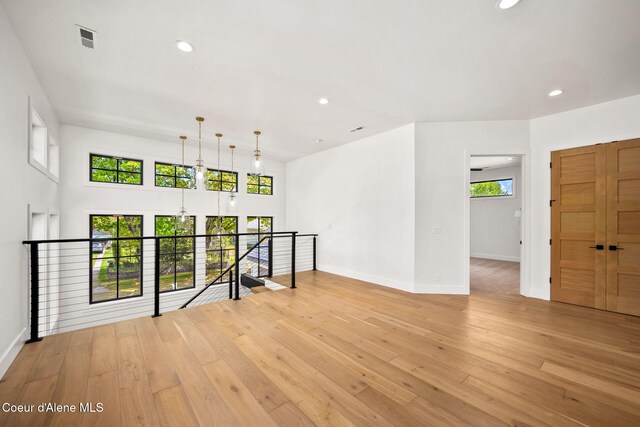 907 N B St, Coeur Dalene, ID 83814 - unfurnished room featuring light wood-style floors, recessed lighting, and baseboards