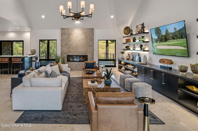 17056 S Lazurite Dr, Coeur Dalene, ID 83814 - living area featuring recessed lighting, high vaulted ceiling, a chandelier, and a fireplace