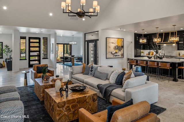 17056 S Lazurite Dr, Coeur Dalene, ID 83814 - living area with recessed lighting, high vaulted ceiling, and a chandelier