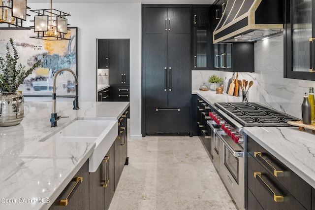 17056 S Lazurite Dr, Coeur Dalene, ID 83814 - kitchen with an inviting chandelier, ventilation hood, a sink, double oven range, and backsplash